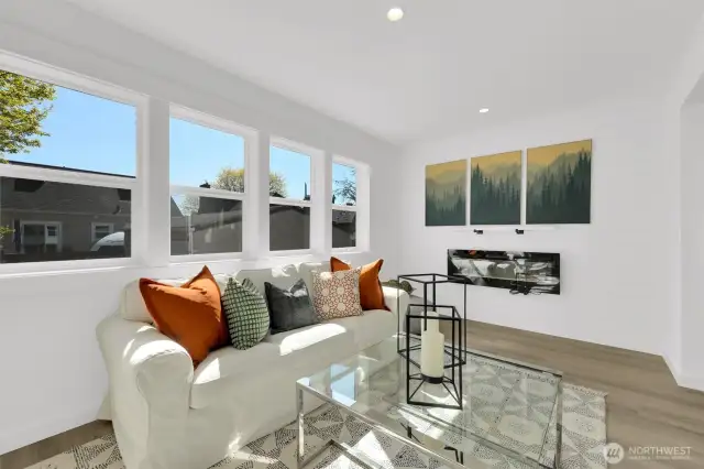 Elegant & stylish electric fireplace enhances relaxing atmosphere - 8040 19th Ave NW, Seattle, WA 98117