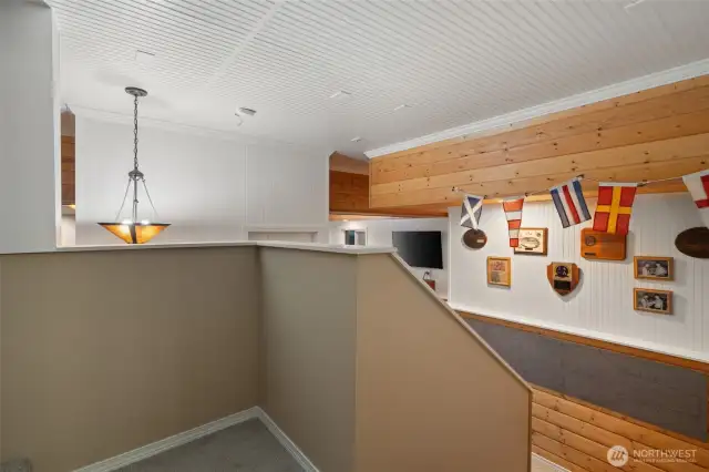Landing leading down to the fully finished basement.