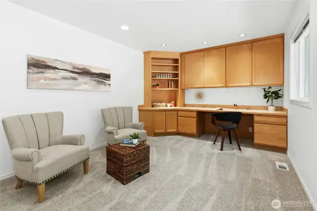 den off kitchen with built in office/craft space