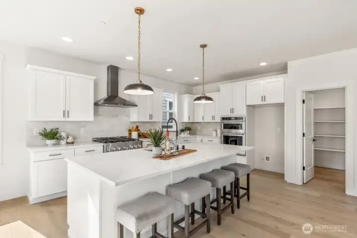 Interior photos are of the Sheridan model home at Maywood Heights. Same floor plan but colors and finishes will vary. Photos are for illustration purposes only.