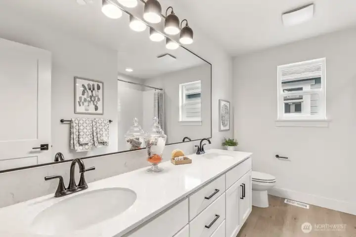 Main bath hall bath on second story. Interior photos are of the Sheridan model home at Maywood Heights. Same floor plan but colors and finishes will vary. Photos are for illustration purposes only.