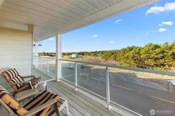 Enjoy a glimpse of the ocean and broad summer sunsets