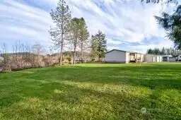 Home and yard from corner of property