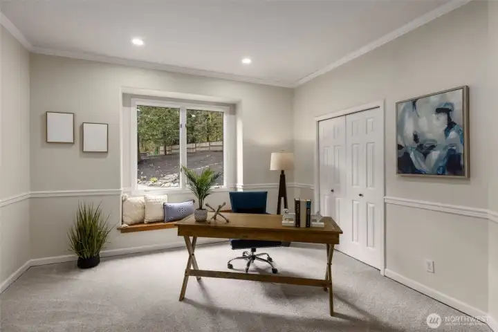 Main level  bedroom/office with connected bath and shower