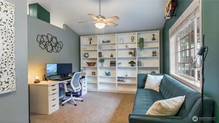 Room near the front door makes a great office! Built-in bookcase is included.