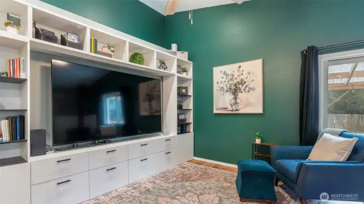 Entertainment center and 83" TV are included!