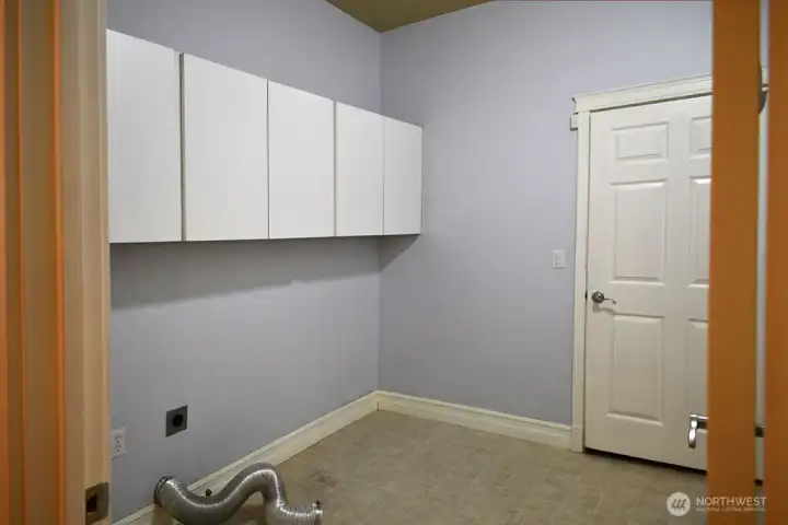 Utility Room with cabinets