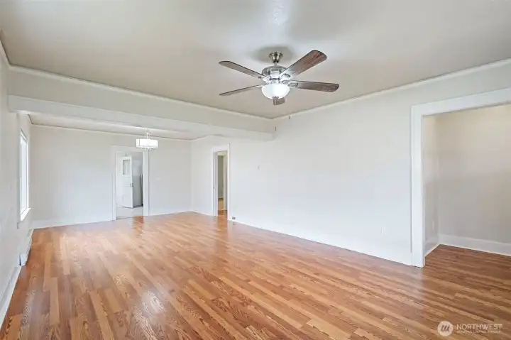 View of living room looking into the kitchen doorway.