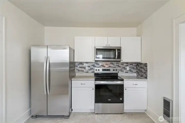 New appliances and backsplash installed.