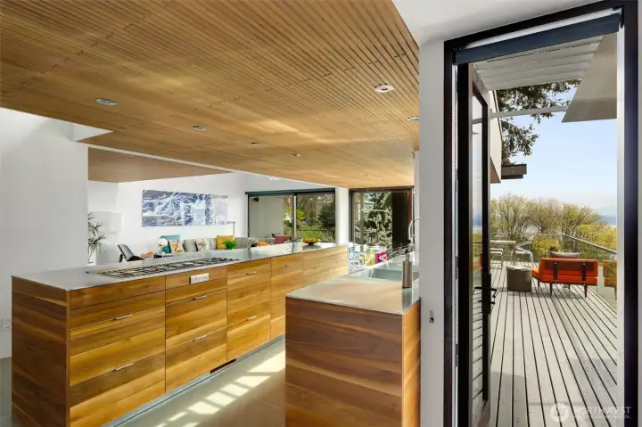 Easy access to covered grill station off kitchen