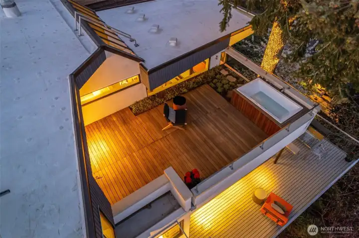 Multi-tiered decks off both main and upper floors