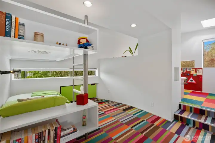 Kids room adjacent to primary suite is spaciouls and joyful