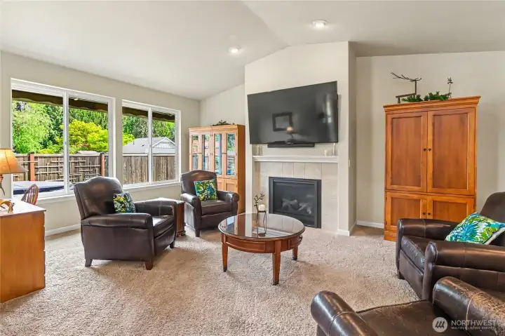 Extra-large living room. Wall mounted TV conveys.
