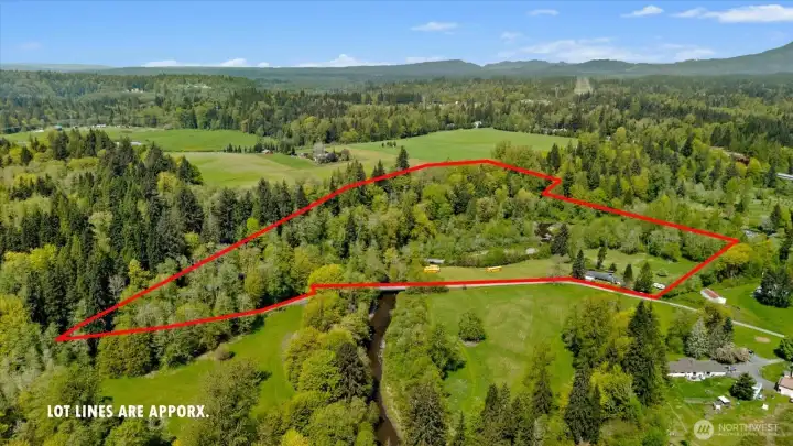 Nearly 12 acres of serene privacy and landscape.