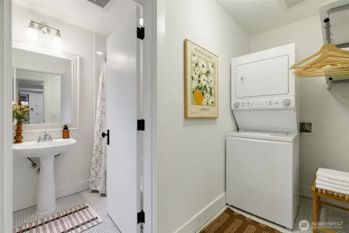 Spacious laundry area right off the bathroom