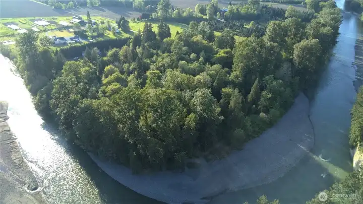 11 incredible acres with 1400 feet of riverfront