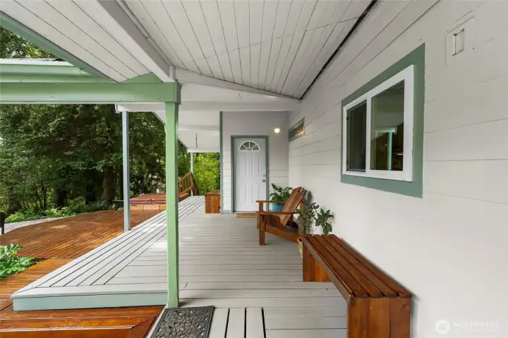Large deck leading you to frint door