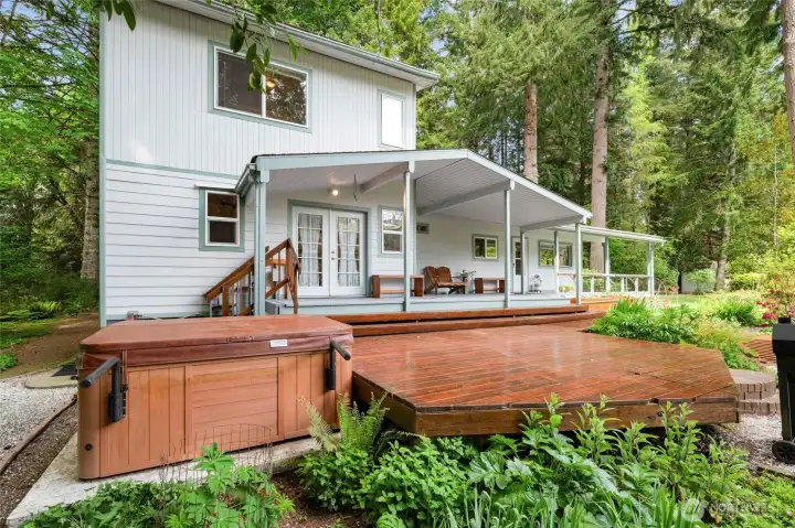 Enjoy all the beauty of the gardens from your lovely deck & hot tub