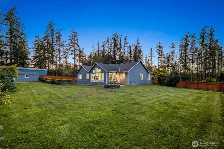 Features expansive usable grounds, including fully fenced backyard...