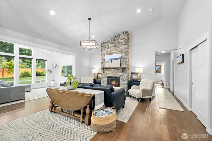 Immediately greeted w/ vaulted ceilings & natural light...