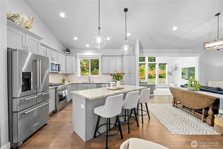 Featuring granite countertops, high-end stainless steel appliances, custom cabinetry...