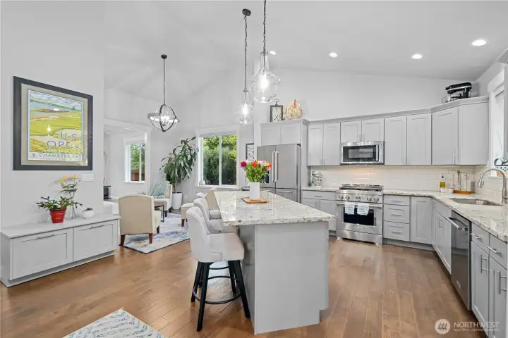 Seamless flow into formal dining & living spaces...