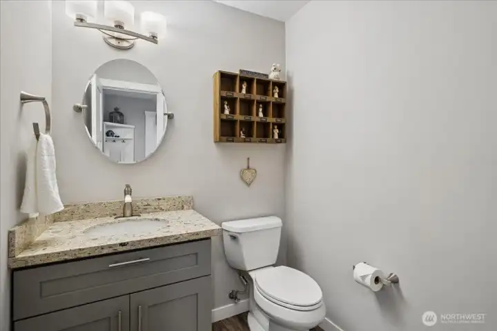 1/2 bath near living room & entry