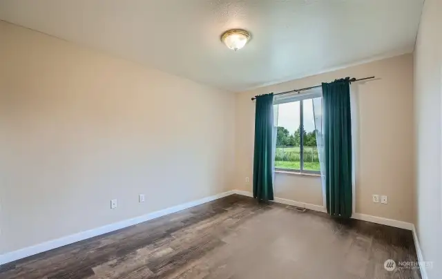 Bedroom with newer flooring