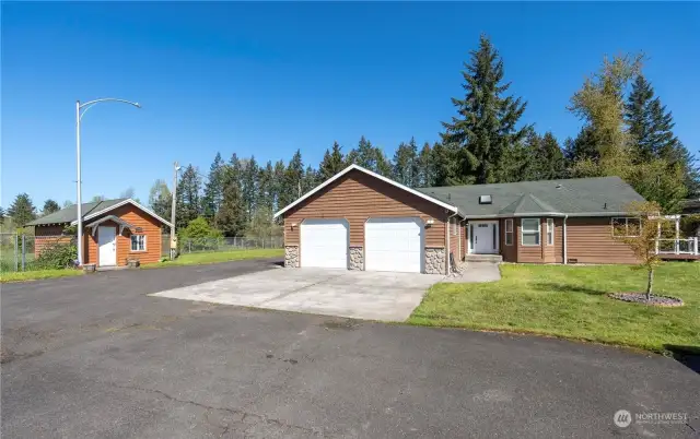 Driveway leading to the oversized garage