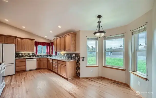 Spacious kitchen with granite countertops and plenty of cabinets