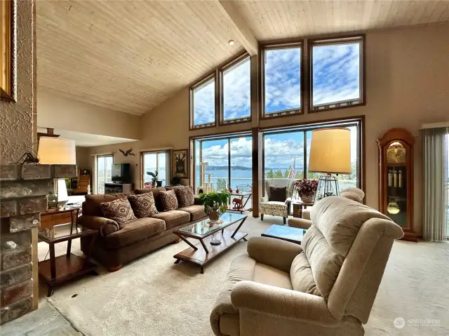 Unparalleled 180-degree views of Mt Baker, Utsalady Bay, Whidbey and even Whistler can be seen from this gorgeous custom built home.