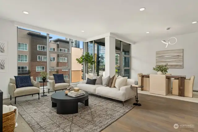 Large open living flanks the connecting dining room with ample space for dining