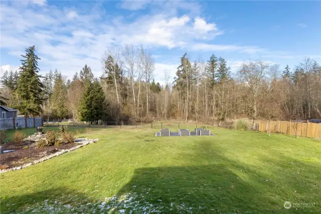 The property goes back beyond the fence. According to the sellers, the back fence line for the neighbor on the left is roughly where this property ends.