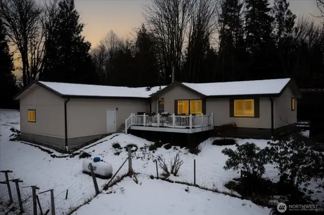 Large deck overlooks the tranquil pond and pasture