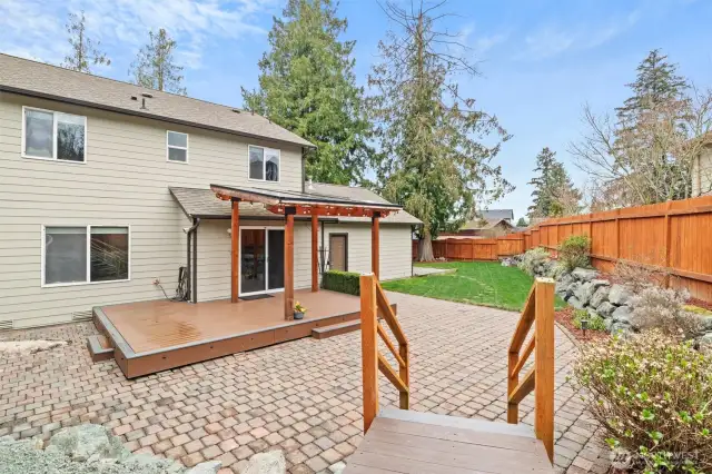 Backyard with covered deck to enjoy all year