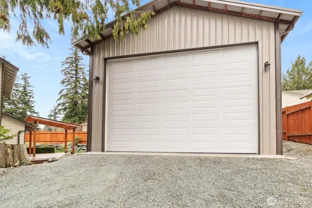 full size garage door on shop- can fit RV or boat