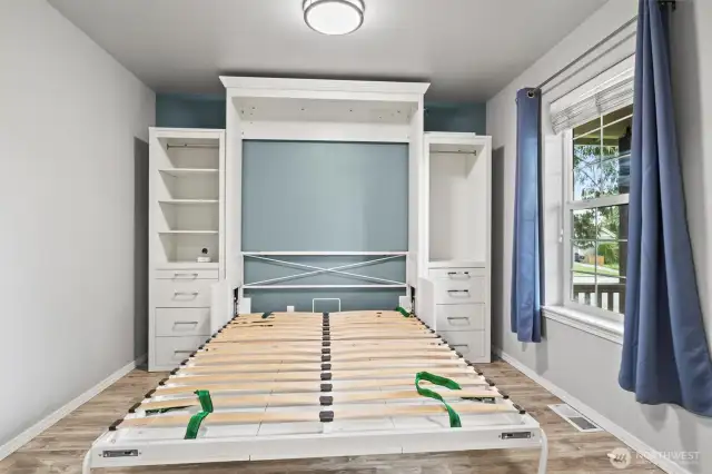 Built-in desk is also a murphy bed for an extra bedroom