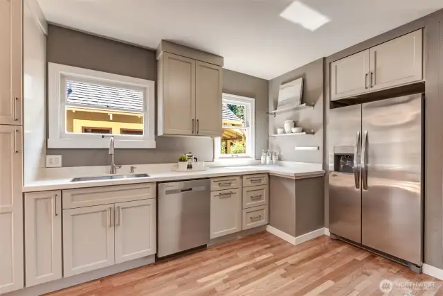 Nice light from the Kitchen windows. New Dishwasher