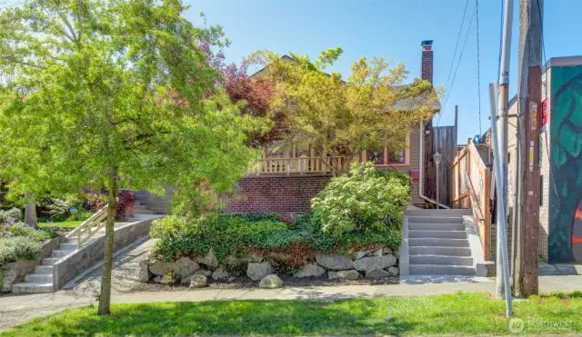 Beautiful Landscaping and the trees provide some nice privacy for sitting on the porch.