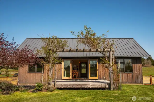 Back entrance and deck, from inside fenced garden