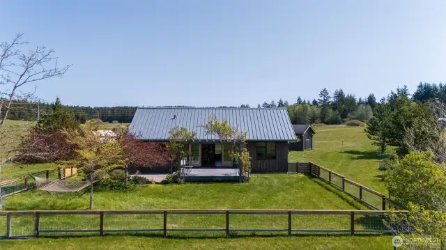 West/back side of house and fenced garden