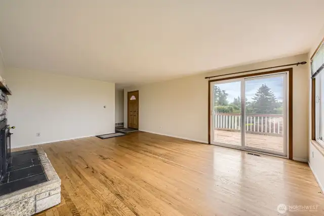 Living room with slider to the deck