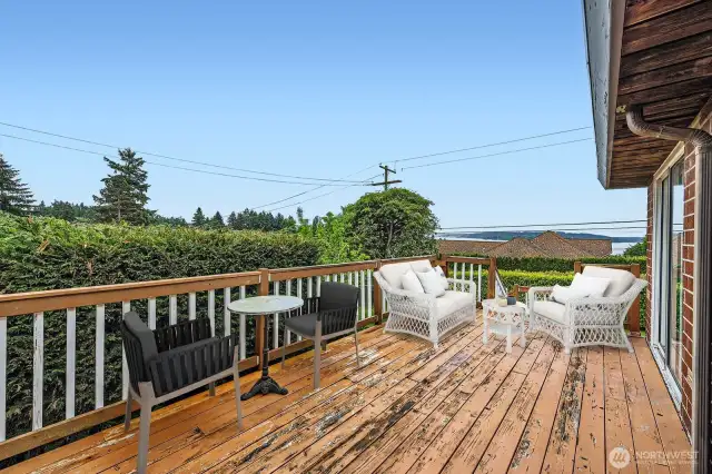 Deck off of the Living room. Virtually Staged