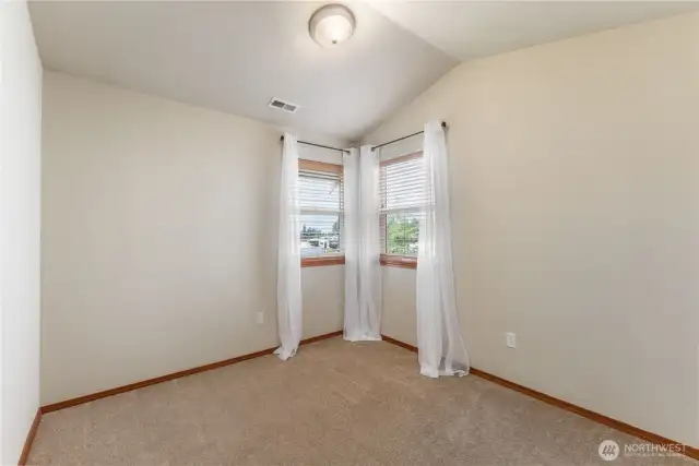 Bedroom 3 including vaulted ceilings