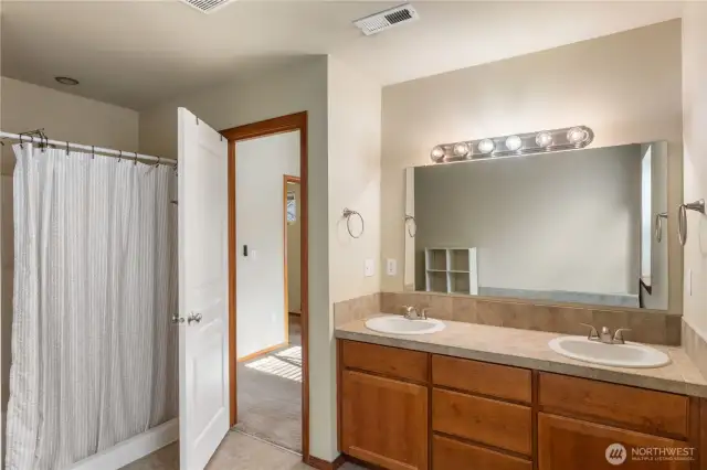 Primary bath with double sinks and shower