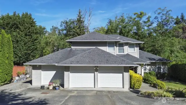 3 car garage & parking for 3 or 4 more.