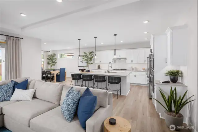 Look at this... How inviting and bright is the kitchen and open spaces.  All pictures are of model home.  Layout is the same, but materials and colors will vary.