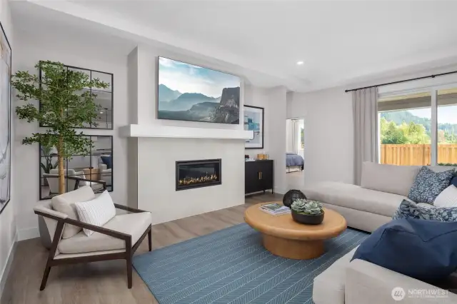 Great room w/gas fireplace, Smurf tube and outlet ready. All pictures are of model home.  Layout is the same, but materials and colors will vary.