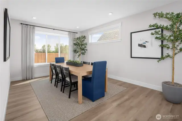Dining Room, very spacious and plenty of wall space for larger furniture. All pictures are of model home.  Layout is the same, but materials and colors will vary.