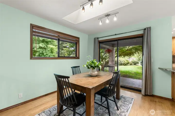 Dining room with sliding door out to patio and deck.
